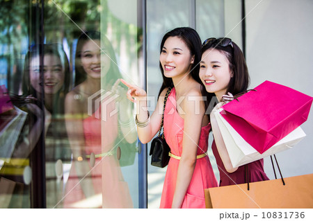 Young asian female shoppers Young asian female shoppers 10831736