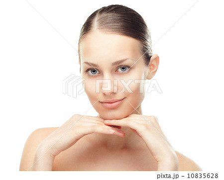Young woman with cosmetic cream on a cheek 10835628