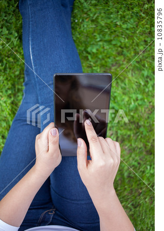 Woman using digital tablet PC 10835796
