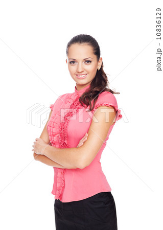 beautiful young smiling businesswoman standing with hands folded beautiful young smiling businesswoman standing with hands folded 10836129