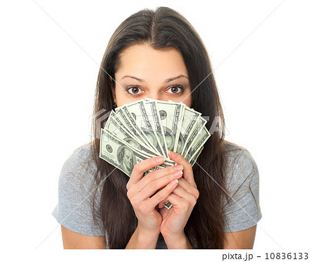 Young woman holding a dollar bills Young woman holding a dollar bills 10836133
