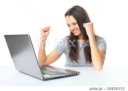 Young woman having success online on her laptop 10836152