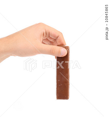 Hand hold chocolate bar. 10845865