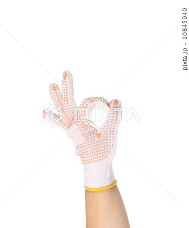 Thin work glove showing a ok sign. Thin work glove showing a ok sign. 10845940