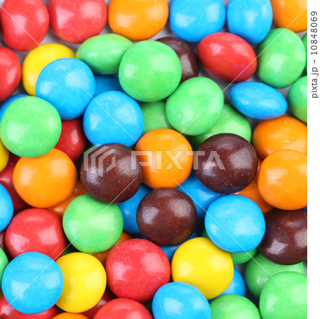 Chocolate balls in colorful glaze. 10848069