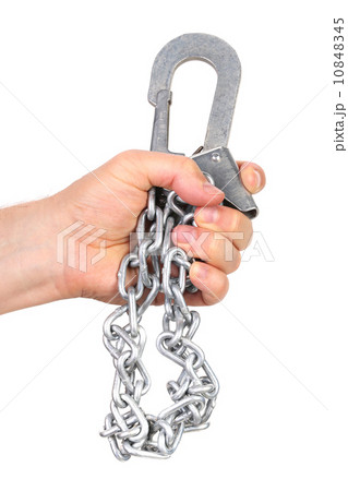 Hand holds carbine on chain. Hand holds carbine on chain. 10848345