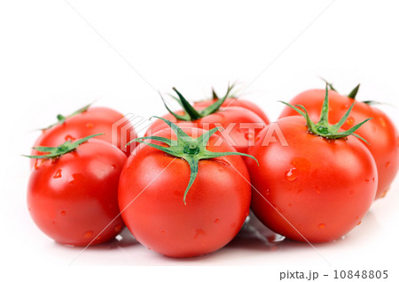 Fresh tomatoes with green leaves. 10848805