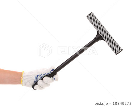 Hand in gloves with rubber window cleaner. Hand in gloves with rubber window cleaner. 10849272