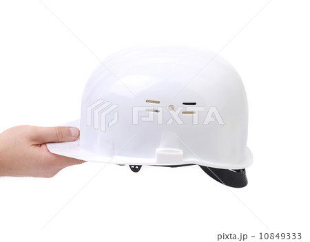 Hand holding orange hard hat. Hand holding orange hard hat. 10849333
