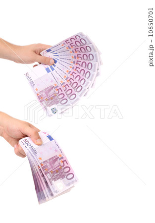Hands holding 500 euros banknotes 10850701