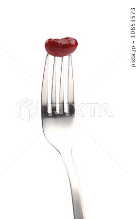Single canned bean on fork. Single canned bean on fork. 10853573