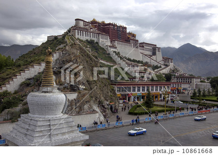 LHASA, TIBET-August 25: pilgrims exit the Potala palace The Palace is the Tibet historic and political landmark August 25, 2013 Lhasa, Tibet. 10861668