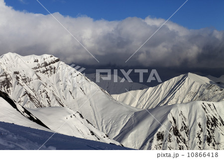 Sunny mountains in evening 10866418