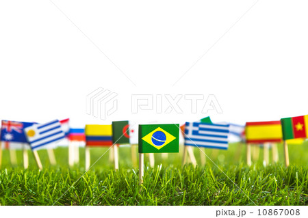 Paper cut of flags on grass for Soccer championship 2014 10867008