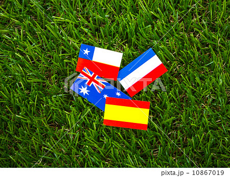 Paper cut of flags on grass for Soccer championship 2014 , group 10867019