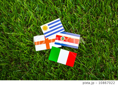 Paper cut of flags on grass for Soccer championship 2014 , group 10867022