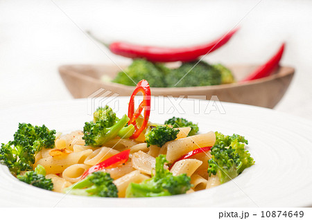 Italian penne pasta with broccoli and chili pepper Italian penne pasta with broccoli and chili pepper 10874649