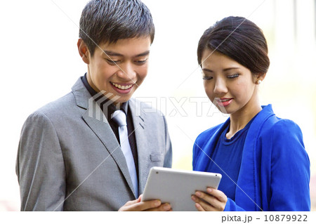 Business office staff looking at tablet Business office staff looking at tablet 10879922