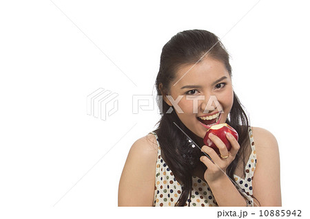 Young woman with red apple Young woman with red apple 10885942
