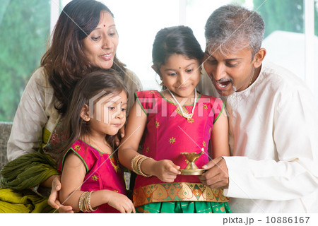 Celebrating diwali Celebrating diwali 10886167