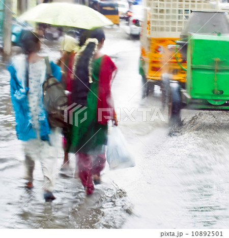 Defocussed view of flash flood at Indian city street 10892501