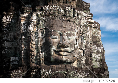 Huge carved Buddha faces of Bayon. Angkor Wat complex, Siem Reap, Cambodia 10892526