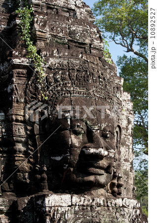 Huge carved Buddha faces of Bayon. Angkor Wat complex, Siem Reap, Cambodia Huge carved Buddha faces of Bayon. Angkor Wat complex, Siem Reap, Cambodia 10892527