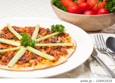 Turkish beef pizza with cucumber on top Turkish beef pizza with cucumber on top 10893839