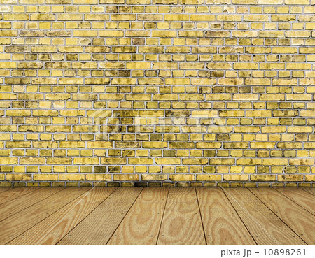 room interior vintage with yellow brick wall and wood floor back 10898261