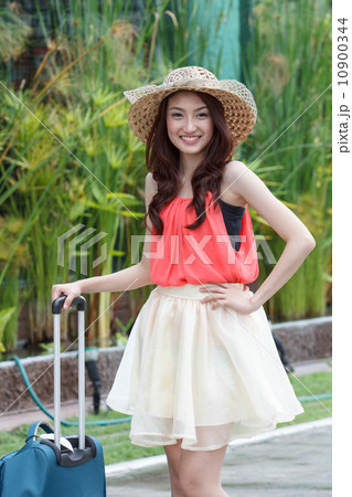 Happy tourist woman 10900344