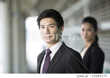 Asian businessman with a serious expression. 10904175