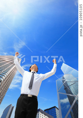 carefree business man arms up carefree business man arms up 10905105