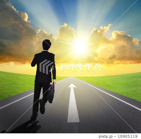 business man running on asphalt road business man running on asphalt road 10905119