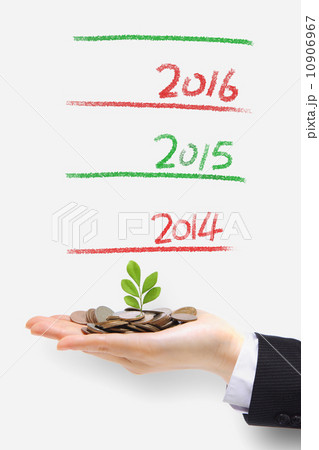 green plant sprouting from money green plant sprouting from money 10906967