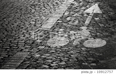 Bicycle lane marking on the old block pavement Bicycle lane marking on the old block pavement 10912757