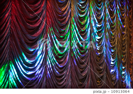 Illuminated colorful curtain background texture 10913064