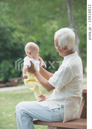 chinese asian grandfather having fun with his grandson outdoor chinese asian grandfather having fun with his grandson outdoor 10918813