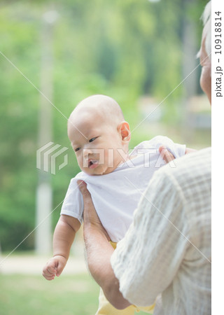 chinese asian grandfather having fun with his grandson outdoor chinese asian grandfather having fun with his grandson outdoor 10918814