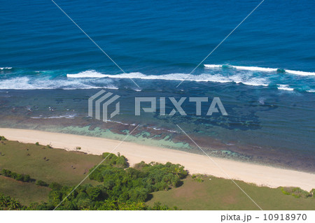 Ocean and  sandy beach. 10918970
