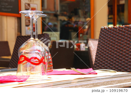 Table in the cafe serving famous Venetian Murano glasses 10919670