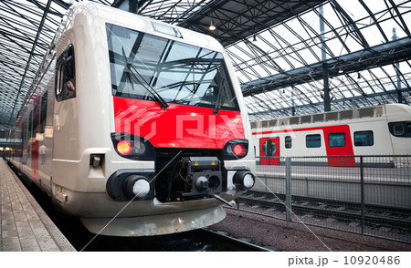Perspective view of the modern electric express train on a platform 10920486