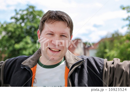 Young beautiful man enjoying spring sun Young beautiful man enjoying spring sun 10923524