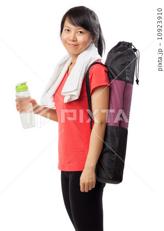 Woman with exercise mat 10923910