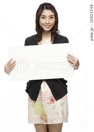 Businesswoman holding blank whiteboard sign Businesswoman holding blank whiteboard sign 10925548