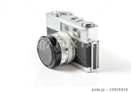 Retro photo camera isolated on white 10926928