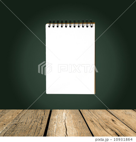 single face notebook on greenboard with clipping path single face notebook on greenboard with clipping path 10931864