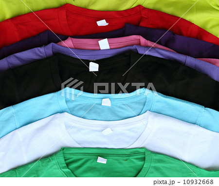 several colorful t-shirts 10932668