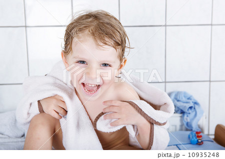 Portrait of lovely little toddler boy of two years with bath to Portrait of lovely little toddler boy of two years with bath to 10935248