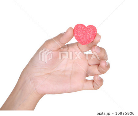 hands holding heart candy hands holding heart candy 10935906