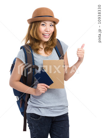Woman traveler with backpack and passport 10938330